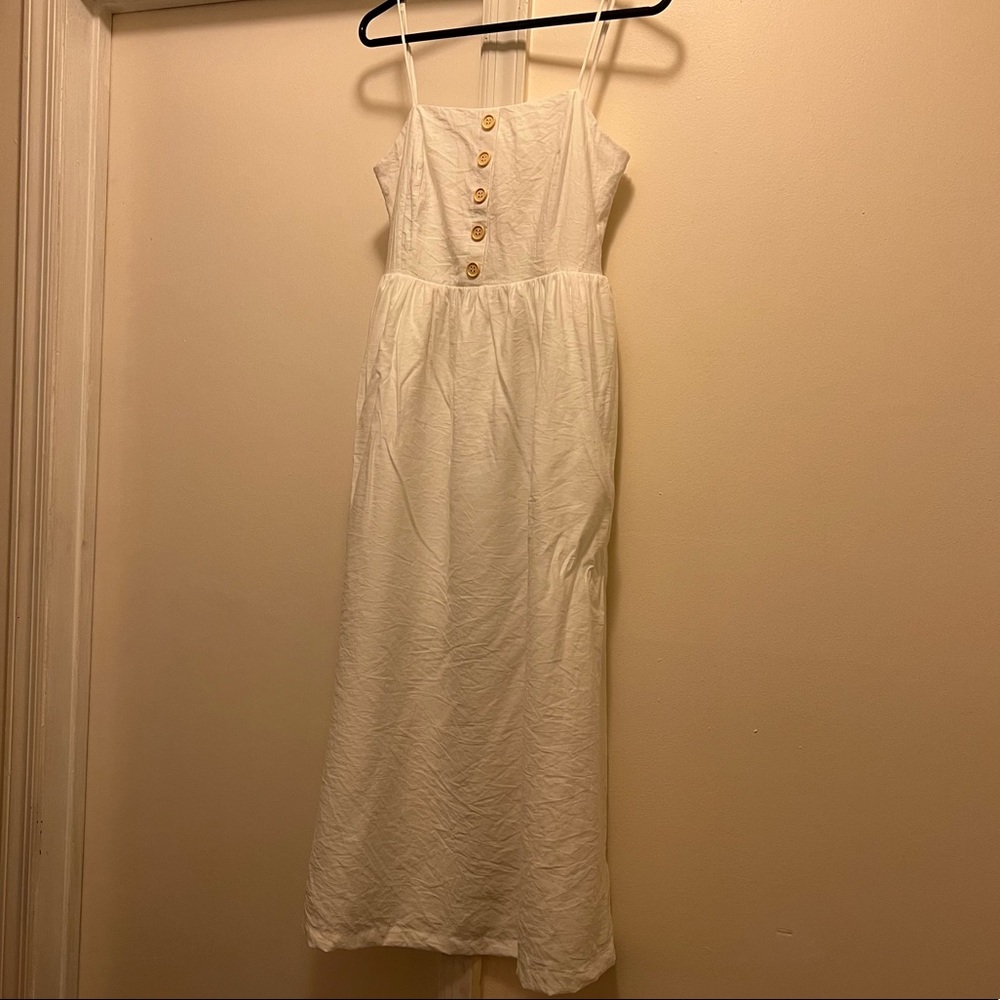 Ivory midi dress, spaghetti straps with tan buttons